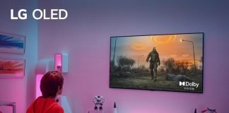 A gamer being completely immersed in a video game at home thanks to LG OLED TV’s Dolby Vision at 4K 120Hz