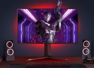 The complete gaming setup boasting an LG UltraGear™ gaming monitor which is displaying a futuristic shooting title, a controller for console play, speakers, headphones and a keyboard.